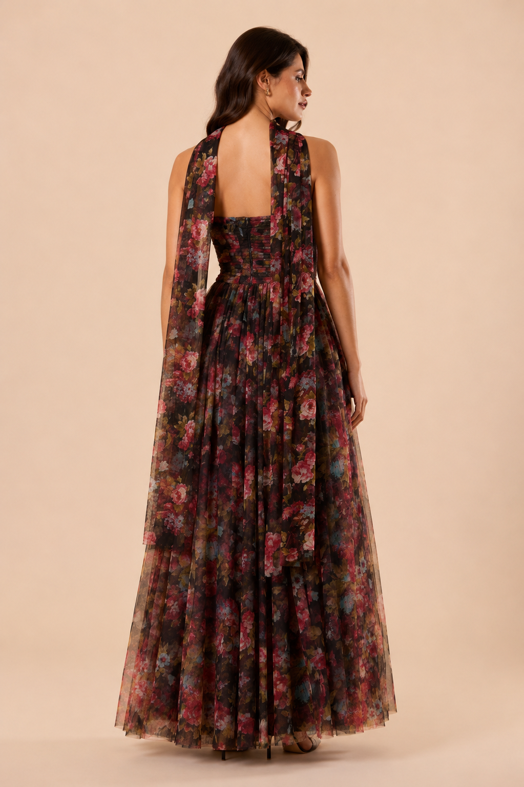 "Dark floral tulle strapless maxi dress with sweetheart bodice and detachable sheer scarf."
