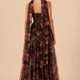 "Dark floral tulle strapless maxi dress with sweetheart bodice and detachable sheer scarf."
