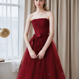 Elegant Strapless Burgundy Tulle Ball Gown with Corset Back and Ribbon Tie