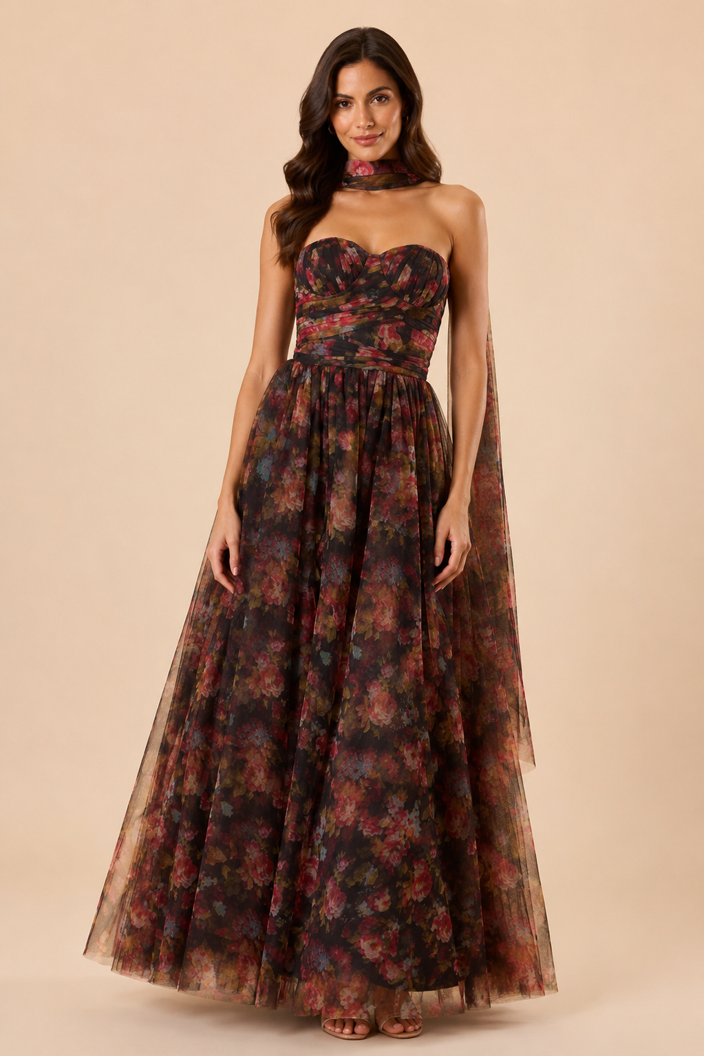 "Dark floral tulle strapless maxi dress with sweetheart bodice and detachable sheer scarf."
