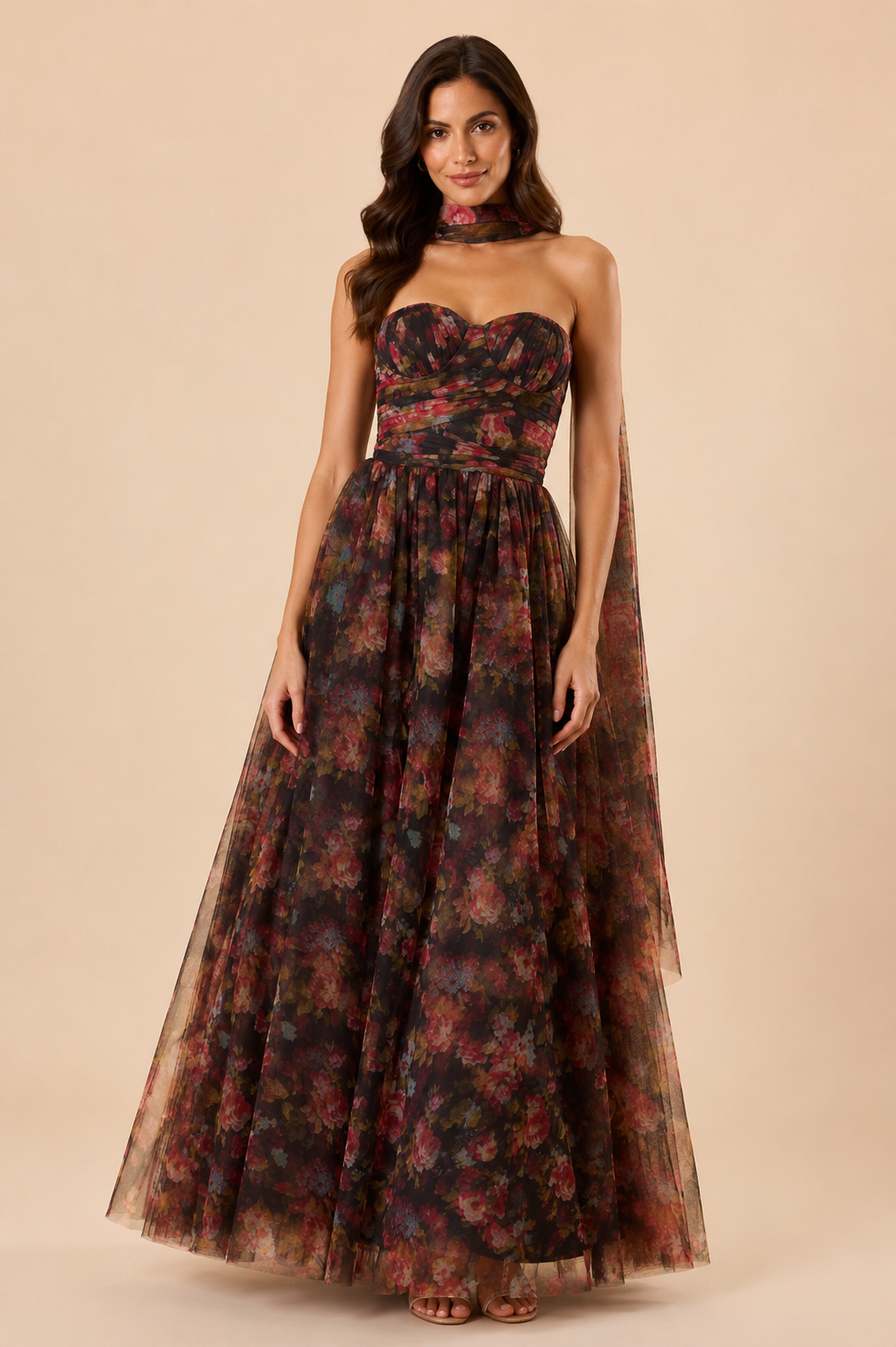 "Dark floral tulle strapless maxi dress with sweetheart bodice and detachable sheer scarf."
