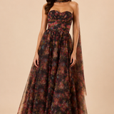 "Dark floral tulle strapless maxi dress with sweetheart bodice and detachable sheer scarf."
