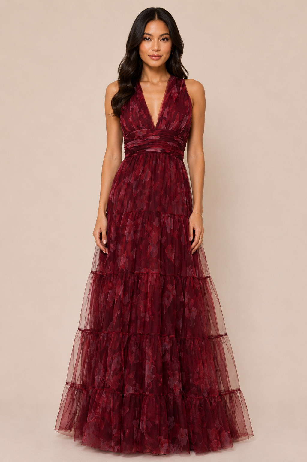 "Burgundy floral tulle tiered maxi dress with plunging halter neckline and open tie-back."
