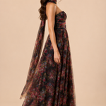 "Dark floral tulle strapless maxi dress with sweetheart bodice and detachable sheer scarf."
