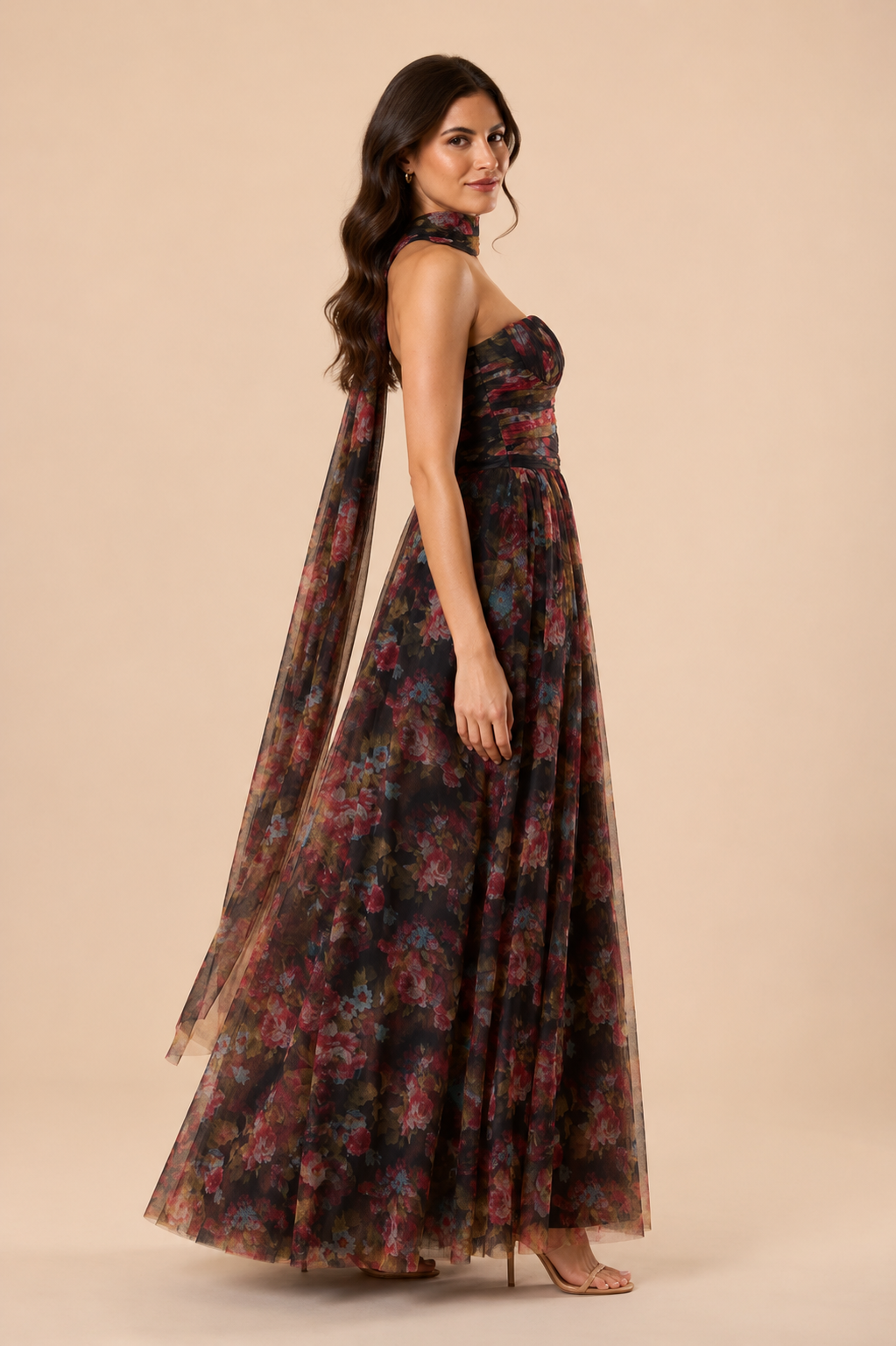 "Dark floral tulle strapless maxi dress with sweetheart bodice and detachable sheer scarf."
