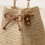Mini Handwoven Raffia Drawstring Crossbody Bag