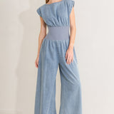 RUNNING IN DENIM JUMPSUIT