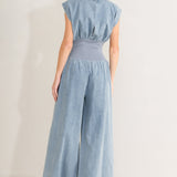 RUNNING IN DENIM JUMPSUIT