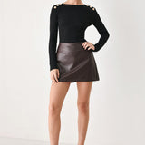 REBEL ROMANCE FAUX LEATHER SKORT
