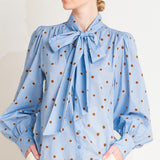 THE POLKA POWER MOVE WOVEN TOP