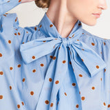 THE POLKA POWER MOVE WOVEN TOP