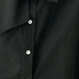 MODERN STATEMENT BOW WOVEN TOP