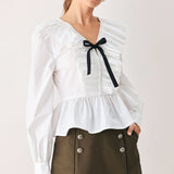 AMELIE PLEATED RUFFLE V-NECK WOVEN TOP