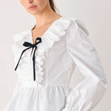 AMELIE PLEATED RUFFLE V-NECK WOVEN TOP