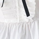 AMELIE PLEATED RUFFLE V-NECK WOVEN TOP