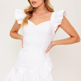 EXPLORING NEW CITIES WOVEN SKORT ROMPER