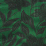 Fabric detail of Flying Tomato Noir Leaf Green Woven Top in green/black
