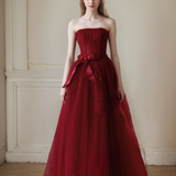 Elegant Strapless Burgundy Tulle Ball Gown with Corset Back and Ribbon Tie
