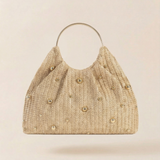 Artisanal Studded Handwoven Raffia Bag with Sculptural Gold Ring Handle