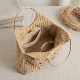 Artisanal Studded Handwoven Raffia Bag with Sculptural Gold Ring Handle