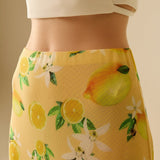 Yellow Fitted midi skirt with lemon print in mesh fabric