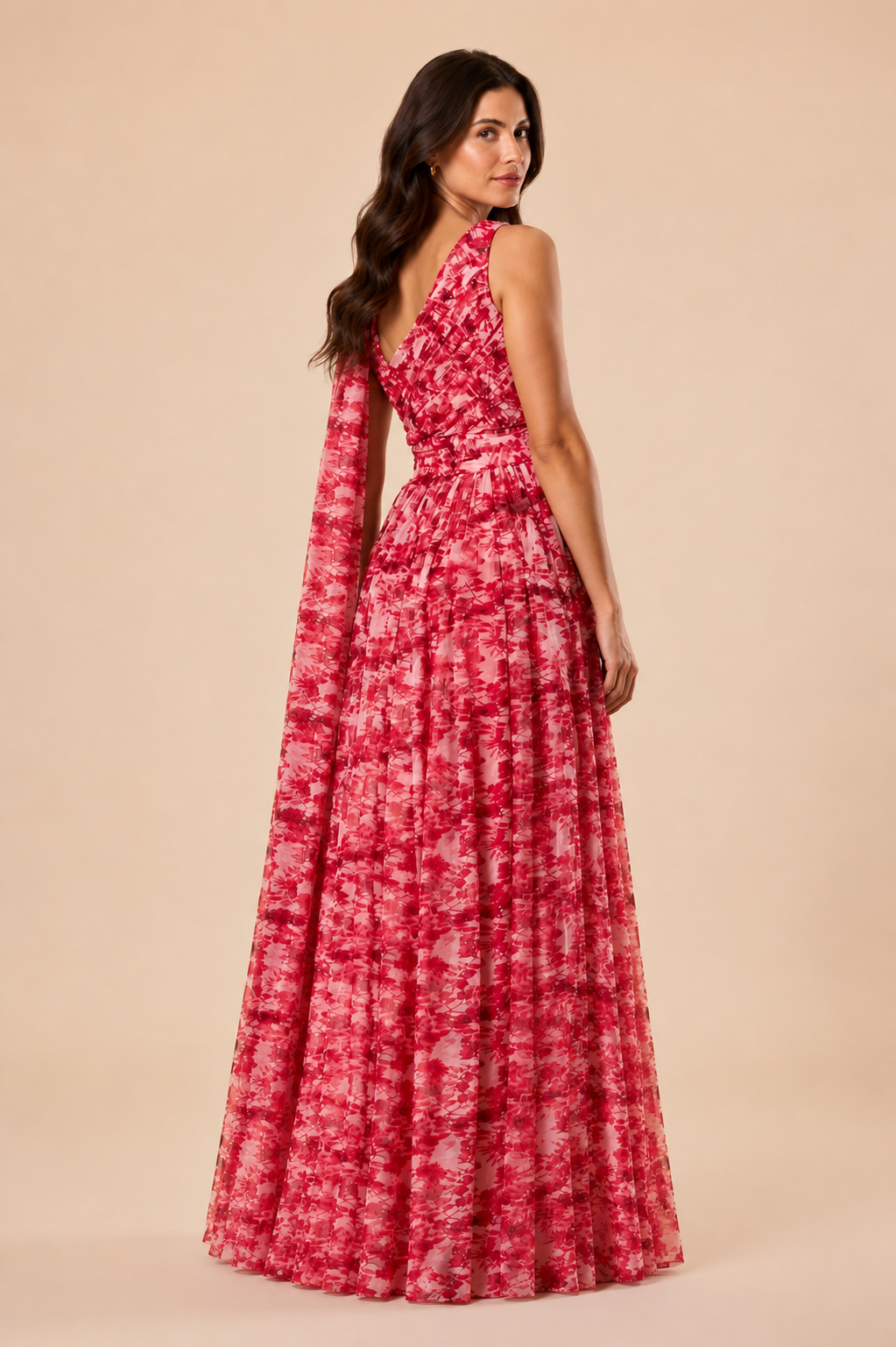"Raspberry floral chiffon one-shoulder maxi dress with pleated bodice and flowing tie scarf."
