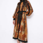 Ambre Poétique orange abstract-print lace-trim maxi dress, front view with black waist sash