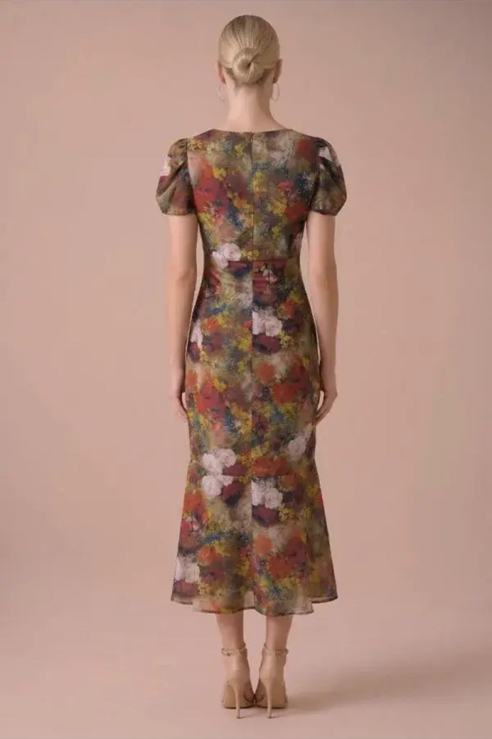 Autumn Muse Floral Twist-Front Midi Dress, back view showing the fitted waist and softly flared midi hem