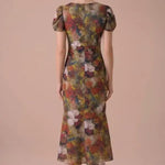 Autumn Muse Floral Twist-Front Midi Dress, back view showing the fitted waist and softly flared midi hem