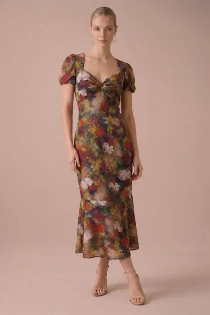 Full-length view of the Autumn Muse Floral Twist-Front Midi Dress with sweetheart neckline and short puff sleeves