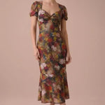 Full-length view of the Autumn Muse Floral Twist-Front Midi Dress with sweetheart neckline and short puff sleeves