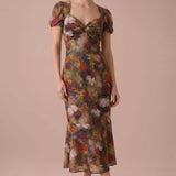 Full-length view of the Autumn Muse Floral Twist-Front Midi Dress with sweetheart neckline and short puff sleeves