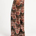 Aveline Doriala Multi wide-leg velvet pants, side view on model