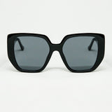 Black pin-up style sunglasses with geometric design and cat eyes