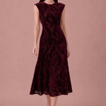 Bordeaux Tapestry burgundy flocked velvet midi dress, walking front view