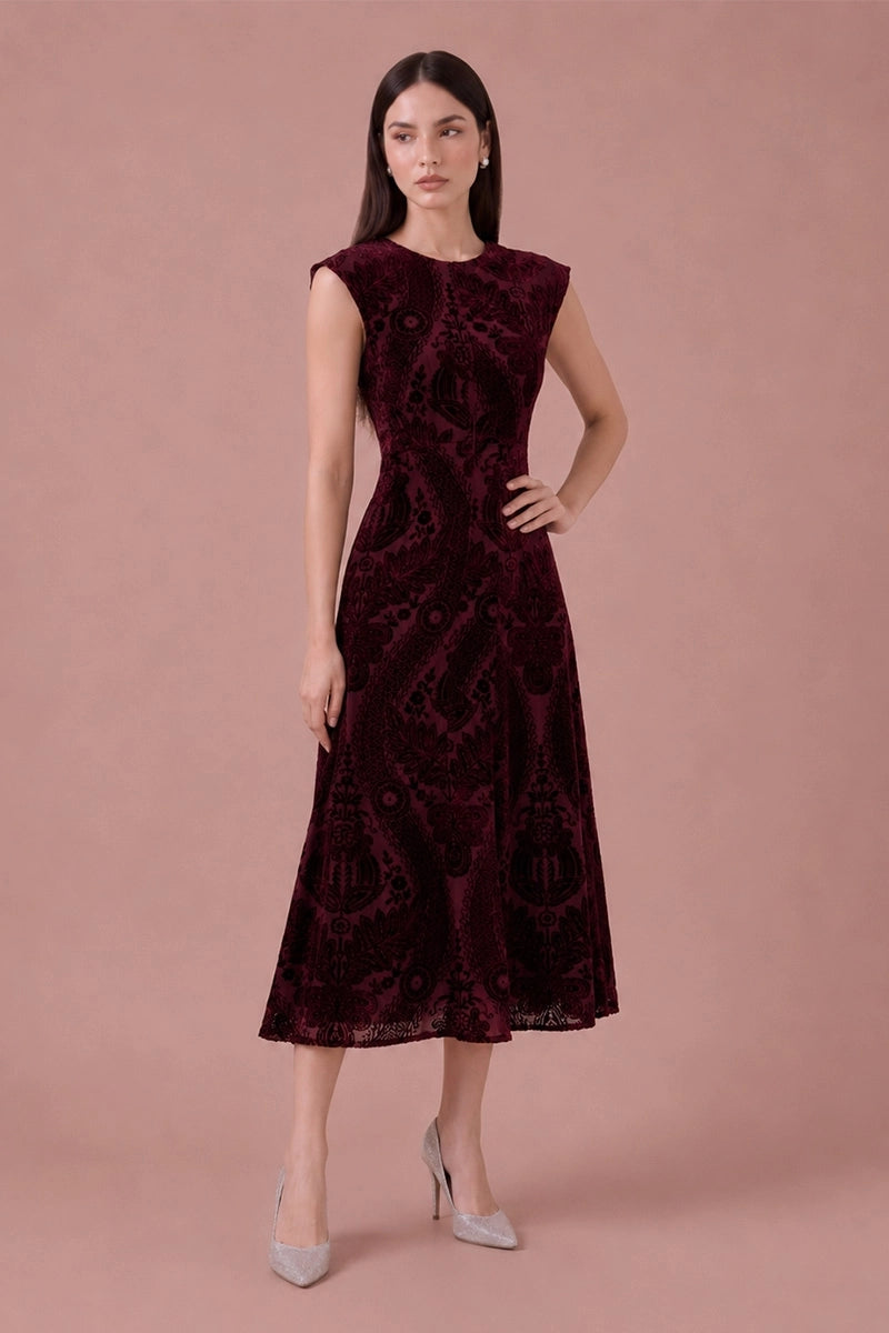 Bordeaux Tapestry burgundy flocked velvet midi dress, front with hand on hip view