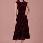 Bordeaux Tapestry burgundy flocked velvet midi dress, front with hand on hip view
