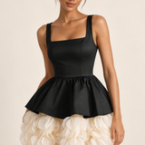 Colette black and ivory petal peplum mini dress, half-shot view