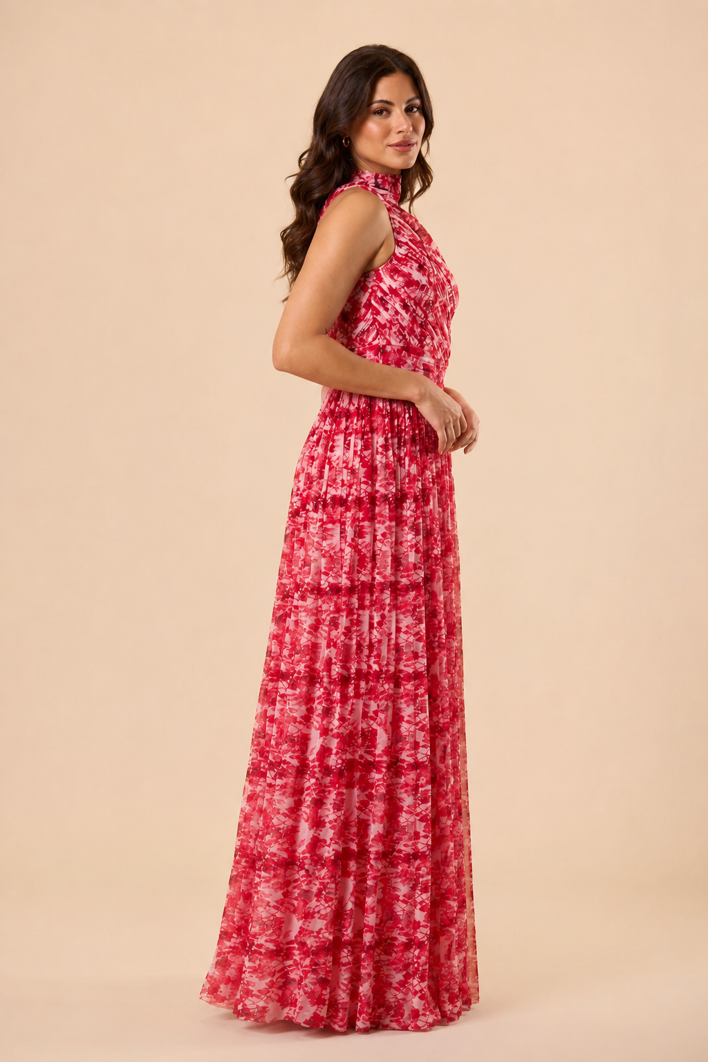 "Raspberry floral chiffon one-shoulder maxi dress with pleated bodice and flowing tie scarf."
