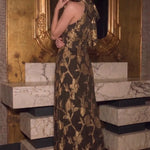 Back view of the Gilded Bloom Halter Jacquard Dress showing the tied halter neckline