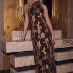 Front view of the Gilded Bloom Halter Jacquard Dress in brown with metallic gold florals