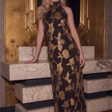 Front view of the Gilded Bloom Halter Jacquard Dress in brown with metallic gold florals