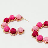 Gold Hoop Earring With Woolen Spheres in Pink and Fuchsia