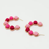 Gold Hoop Earring With Woolen Spheres in Pink and Fuchsia