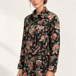 Three-quarter view of the Héloïse Jacquard Jacket in Black Floral, showing the short silhouette
