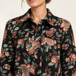 Héloïse Jacquard Jacket in Black Floral, close-up of the collar, chest pockets and woven fabric
