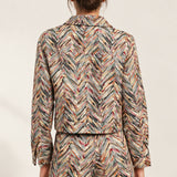 Back view of the Héloïse Jacquard Jacket in Multico Chevron, showing the yoke and straight hem