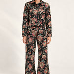 Full-length model wearing the Héloïse Black Floral jacquard jacket and matching wide-leg pants