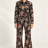 Full-length model wearing the Héloïse Black Floral jacquard jacket and matching wide-leg pants