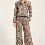 Full-length model wearing the Héloïse Multico Chevron jacquard jacket and matching wide-leg pants